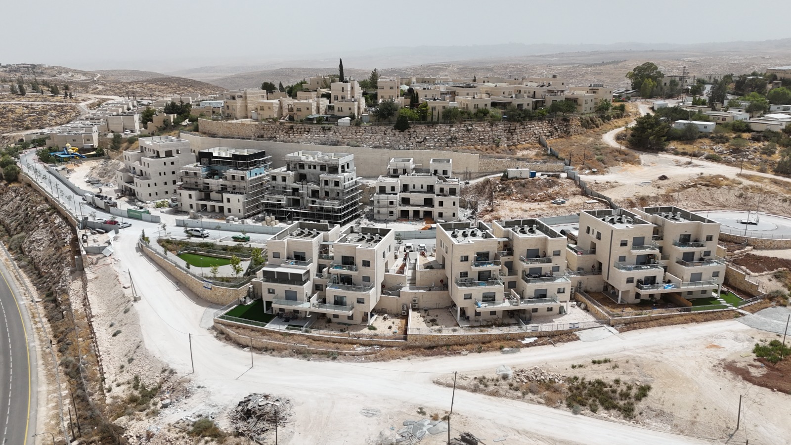 Scenic desert valley and cliffs surrounding Ma’ale Michmash settlement