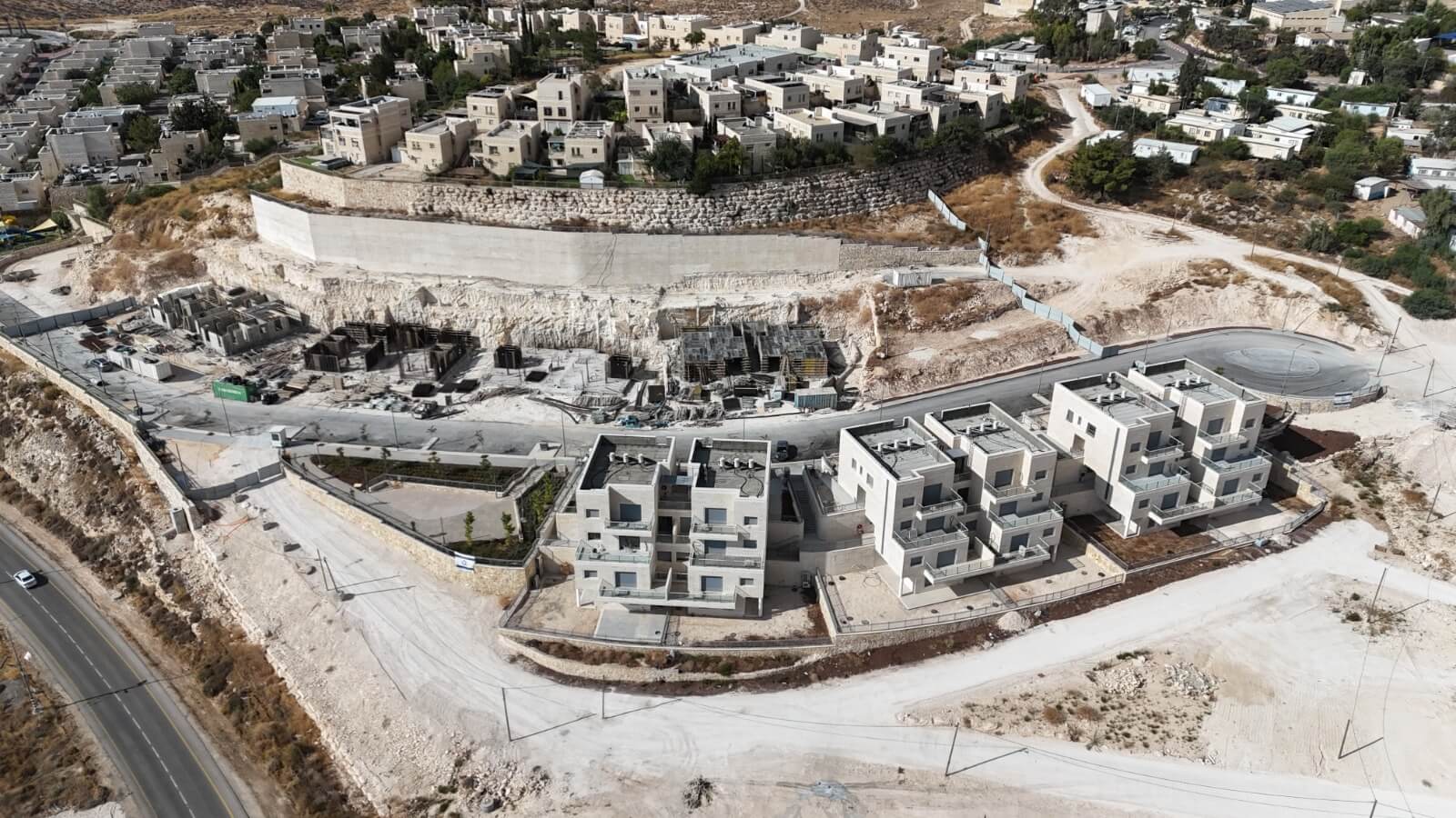 Tiered apartment complex with Jerusalem stone facades in Ma’ale Michmash