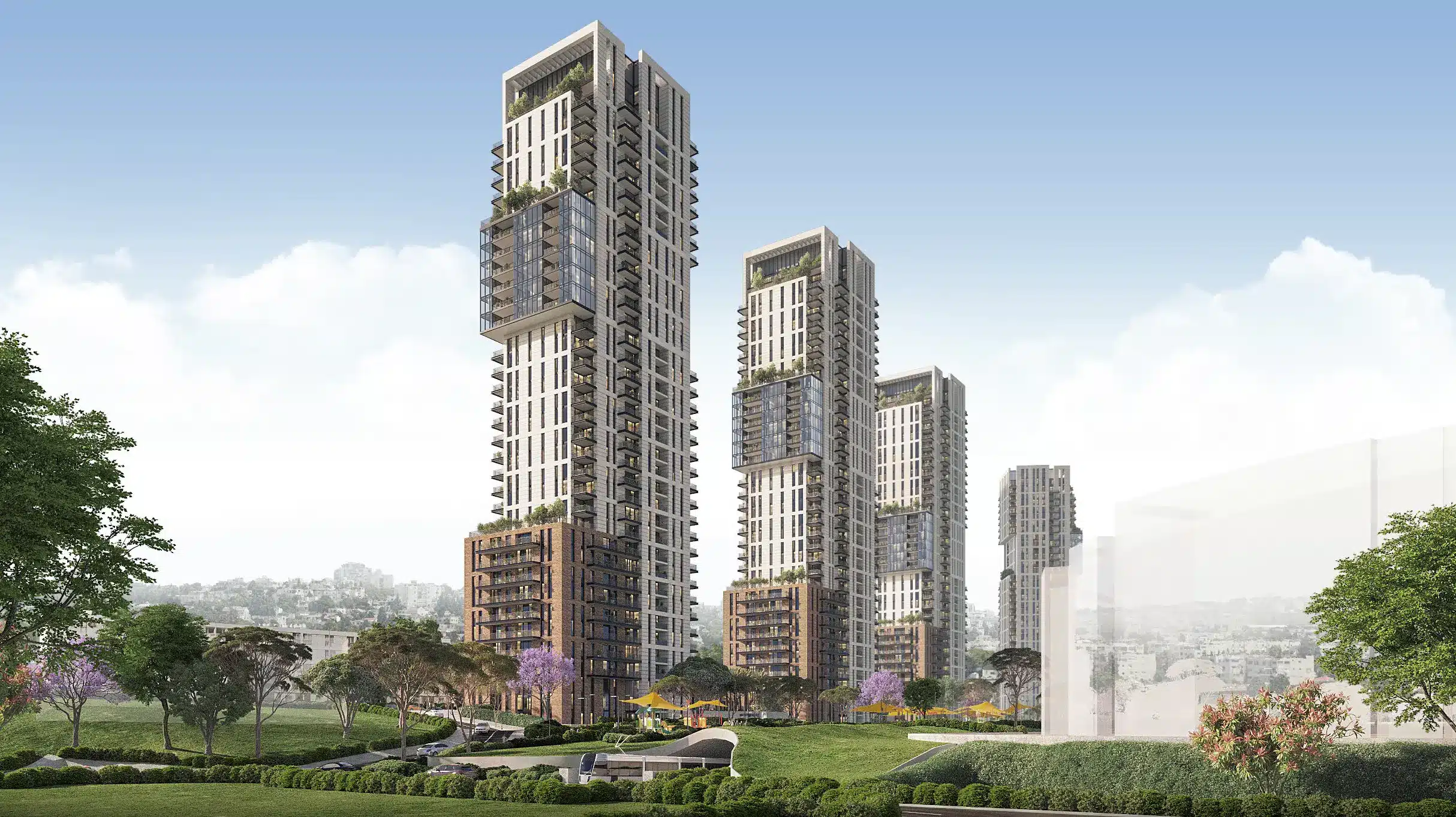 Exterior view of modern apartments in Jerusalem surrounded by green spaces